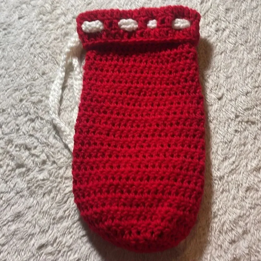 Hand knitted bottle cover